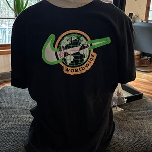 Nike Black Tee with Green and Gold Graphic